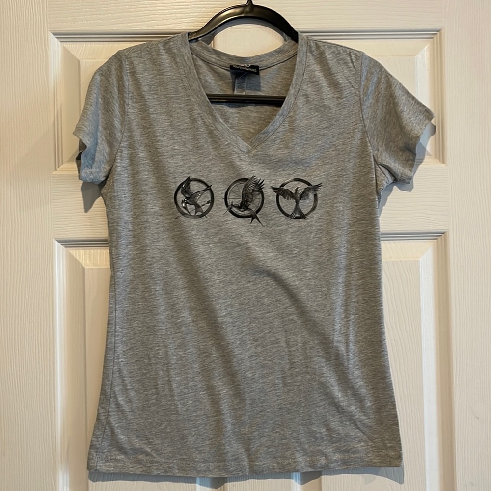 Hunger Games Exhibition T-shirt size XL but I am calling it an athletic style M